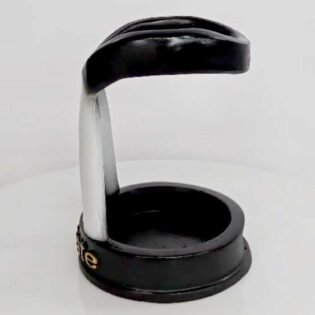 Left side view of lawyer collar pen holder on office desk, showing design and glossy black resin finish, decorative desk organizer for lawyers, advocates, and law students