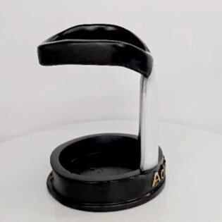 Right side view of lawyer collar pen holder on office desk, showing design and glossy black resin finish, decorative desk organizer for lawyers, advocates, and law students